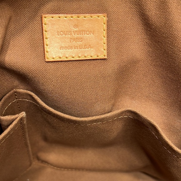 Louis Vuitton Monogrammed GM Travoli - Picture 14 of 16